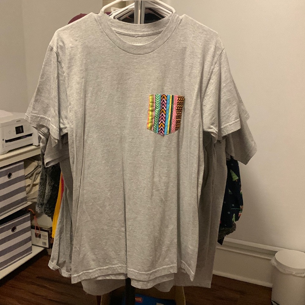 Light Grey Serengetee Short Sleeve Tshirt with colorful patch. UNISEX MEDIUM